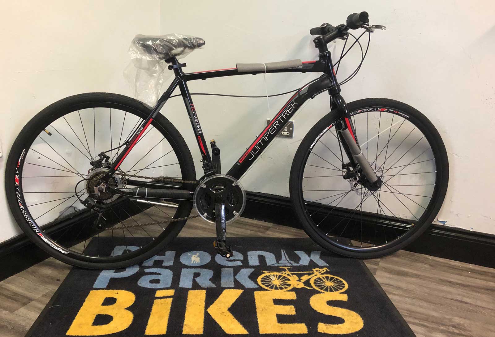 Jumpertrek (Mens) Black | Phoenix Park Bikes